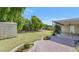 Enjoy the expansive backyard, complete with lush greenery, mature trees, and a storage shed at 8140 E Mitchell Dr, Scottsdale, AZ 85251