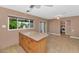 Open kitchen and dining area featuring stylish tile flooring and direct access to the backyard at 8140 E Mitchell Dr, Scottsdale, AZ 85251