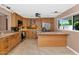 Modern kitchen with stainless steel appliances, sleek countertops, and ample cabinet space at 8140 E Mitchell Dr, Scottsdale, AZ 85251