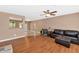 Comfortable living room with hardwood floors, neutral paint, and ample natural light at 8140 E Mitchell Dr, Scottsdale, AZ 85251