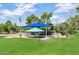 A lush park features picnic spots, a playground, and plenty of green space for recreation at 8140 E Mitchell Dr, Scottsdale, AZ 85251
