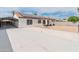 Spacious backyard with a covered patio and a private space for outdoor activities at 9231 W Grovers Ave, Peoria, AZ 85382