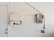 The home's electrical panel and solar panel controller, located in the garage at 9231 W Grovers Ave, Peoria, AZ 85382