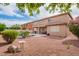 Spacious backyard with mature landscaping, pool, and patio at 9622 S 46Th Ln, Laveen, AZ 85339