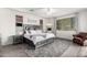 Comfortable bedroom with modern furniture, a ceiling fan, and ample natural light at 9622 S 46Th Ln, Laveen, AZ 85339