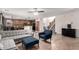 Inviting living room featuring neutral tones, tile floors, and a staircase to the upper level at 9622 S 46Th Ln, Laveen, AZ 85339