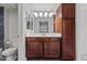 Bathroom featuring updated cabinets, a large mirror, and modern fixtures at 9990 N Scottsdale Rd # 2029, Paradise Valley, AZ 85253