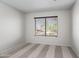 Bright bedroom features neutral carpet and a window with horizontal blinds at 9990 N Scottsdale Rd # 2029, Paradise Valley, AZ 85253