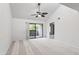 Spacious bedroom features neutral carpet, ceiling fan and sliding doors to balcony at 9990 N Scottsdale Rd # 2029, Paradise Valley, AZ 85253