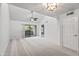 A large bedroom with a ceiling fan and sliding glass doors to a private balcony is bright and airy at 9990 N Scottsdale Rd # 2029, Paradise Valley, AZ 85253