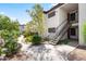 Well-maintained apartment building exterior with updated stairways and landscaping for a welcoming curb appeal at 9990 N Scottsdale Rd # 2029, Paradise Valley, AZ 85253