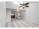 Spacious living room with lots of natural light, vaulted ceiling with fan and open to the kitchen at 9990 N Scottsdale Rd # 2029, Paradise Valley, AZ 85253