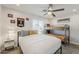 Inviting bedroom with bunk beds, ceiling fan, and décor at 1003 E Marigold Ln, Tempe, AZ 85288