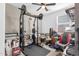 Bedroom with weight rack, ceiling fan and window at 11334 S 52Nd Ln, Laveen, AZ 85339