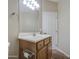 This is a bathroom with a light wood vanity, white countertop, and modern fixtures at 1143 S Annie Ln, Gilbert, AZ 85296