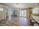 Open floor plan with a dining room leading to a kitchen and an outdoor patio at 1143 S Annie Ln, Gilbert, AZ 85296