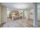 An open concept living space with a kitchen that features a breakfast bar and stainless appliances at 1143 S Annie Ln, Gilbert, AZ 85296