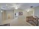 This is a large open loft with neutral carpet, ceiling fans and natural lighting at 1143 S Annie Ln, Gilbert, AZ 85296