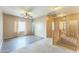Upstairs hallway with neutral carpet and a view of the landing at 120 N Pottebaum Rd, Casa Grande, AZ 85122