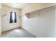 This walk-in closet offers ample storage space and a window for natural light at 120 N Pottebaum Rd, Casa Grande, AZ 85122