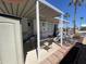 Relaxing covered patio with outdoor seating and tables, perfect for enjoying the outdoors at 1226 S Seneca Dr, Apache Junction, AZ 85119