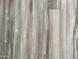 Wood-look laminate flooring adds style and durability to the home's interior at 1226 S Seneca Dr, Apache Junction, AZ 85119