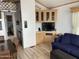 The living room features wood floors and custom cabinet built-ins at 1226 S Seneca Dr, Apache Junction, AZ 85119