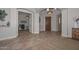 Lovely home entryway with tile floors that opens up to a home office at 13353 W Gloria Ln, Peoria, AZ 85383