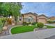 Attractive single-story home displaying manicured lawn, desert landscaping and an attached garage at 13353 W Gloria Ln, Peoria, AZ 85383