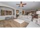 Cozy living room with high ceilings, stylish furniture and neutral color palette at 13353 W Gloria Ln, Peoria, AZ 85383