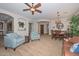 Bright, open-concept home featuring a living room and dining area perfect for entertaining at 13353 W Gloria Ln, Peoria, AZ 85383