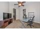 Comfortable home office featuring neutral tones and seamless access to the rest of the home at 13353 W Gloria Ln, Peoria, AZ 85383