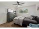 Bedroom with window, dresser and comfortable bed offers a serene and inviting atmosphere at 13614 N 33Rd Ave, Phoenix, AZ 85029
