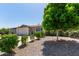 Charming single-story home with desert landscaping and a spacious driveway at 13614 N 33Rd Ave, Phoenix, AZ 85029