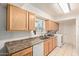 Efficient kitchen featuring modern appliances and ample cabinet space and tile flooring at 13614 N 33Rd Ave, Phoenix, AZ 85029