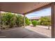 Covered patio with gravel landscaping and an exterior view of the home at 1395 E Runaway Bay Dr, Chandler, AZ 85249