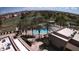 Aerial view of the community pool area, showcasing the pool, and lush landscaping at 1395 E Runaway Bay Dr, Chandler, AZ 85249
