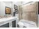 Bathroom with a glass shower, a single sink vanity and decor at 14523 E Charter Oak Dr, Scottsdale, AZ 85259
