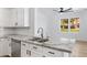 Gourmet kitchen featuring granite counters, stainless appliances and subway tile at 1563 S Longspur Ln, Gilbert, AZ 85296