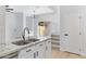 Gourmet kitchen featuring granite counters and stainless appliances at 1563 S Longspur Ln, Gilbert, AZ 85296