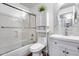 Clean bathroom featuring glass shower doors, white cabinet, and modern sink at 15743 N 165Th Ln, Surprise, AZ 85388