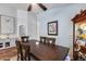 Charming dining room showcasing a classic wooden dining table with seating for six at 15743 N 165Th Ln, Surprise, AZ 85388