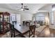 Bright open living space with a large dining table, comfortable seating, and ample natural light at 15743 N 165Th Ln, Surprise, AZ 85388