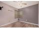Standard bedroom with a ceiling fan and light neutral walls at 16017 S 12Th Pl, Phoenix, AZ 85048
