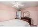 Bright bedroom featuring a ceiling fan, modern décor, and a comfortable bed at 16017 S 12Th Pl, Phoenix, AZ 85048