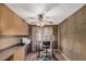 Well-lit home office space with light walls and lots of desk and storage space at 16017 S 12Th Pl, Phoenix, AZ 85048
