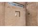 Custom tiled shower with built-in shelf at 16017 S 12Th Pl, Phoenix, AZ 85048
