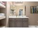 Well-lit bathroom with modern vanity, neutral color scheme, and decorative touches at 16626 E Westby Dr # 108, Fountain Hills, AZ 85268
