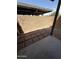 A partially brick backyard offers outdoor enjoyment and relaxation at 170 E Guadalupe Rd # 173, Gilbert, AZ 85234