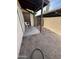 Enclosed patio with dirt area and cinder block perimeter wall, plus covered patio at 170 E Guadalupe Rd # 173, Gilbert, AZ 85234